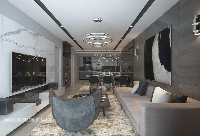 Phòng khách chung cư hiện đại được thiết kế theo gam màu nâu trầm trung tính, mang đến cảm giác bình yên nhẹ nhàng thư giãn đến lạ cho cả gia đình Mẫu nội thất chung cư hiện đại